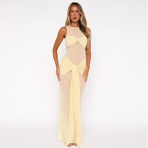 Detailed view of pale yellow mesh fabric with elegant twists and sheer paneling details