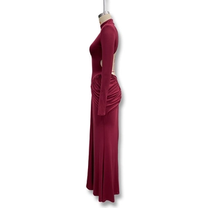 Detailed side view of backless burgundy maxi dress with high neck and side ruching