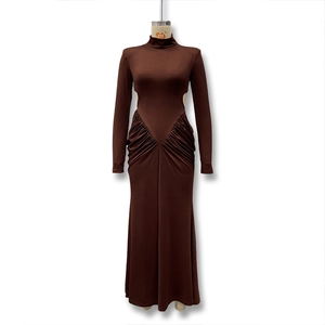 Detail view of brown bodycon maxi dress with side cut-outs and pleated waist design