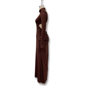 Detail of side cut-out and ruched texture on chocolate brown long sleeve dress