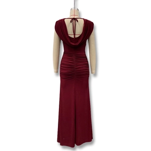 Detail of ruched waist and back lace-up design on a wine red elegant maxi dress