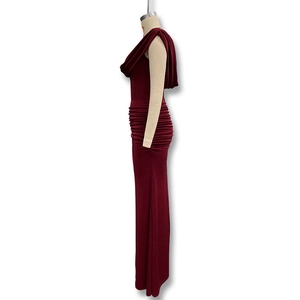 Detailed side view of elegant cowl neck and side ruching on a burgundy maxi dress