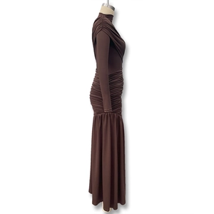 Detail showing the side view of coffee brown ruched long sleeve dress with slim fit fabric