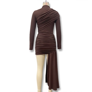 Detail view of the brown ruched long sleeve dress with elegant side flowing ribbons