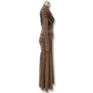 Detail view of ruching textures and mermaid silhouette on brown slim-fit dress