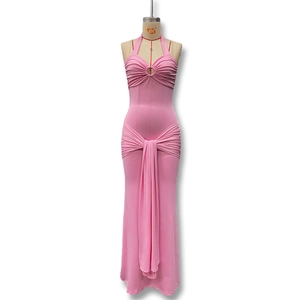 Detail of pink halter dress with ruched bodice, metal ring and decorative waist ties