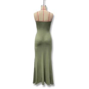 Detail of a slim-fit olive green sleeveless maxi dress with elegant back seam stitching