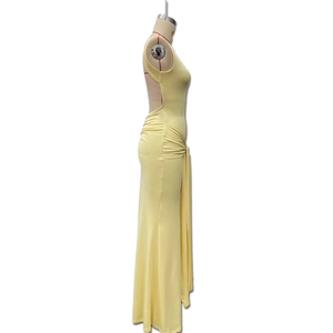 Detailed side view of light yellow backless maxi dress with elegant waist ruching