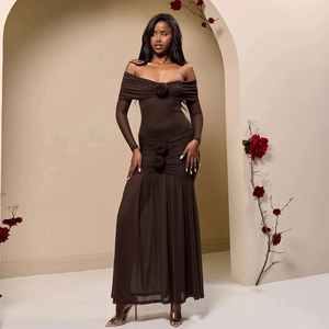 Detail of the 3D rose decoration and ruched fabric on this dark brown off-shoulder dress