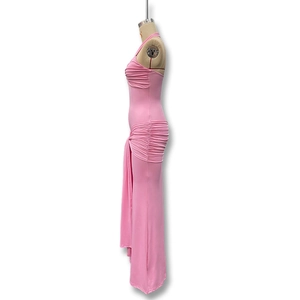 Detailed side view of pink halter dress featuring ruching details and side drape design