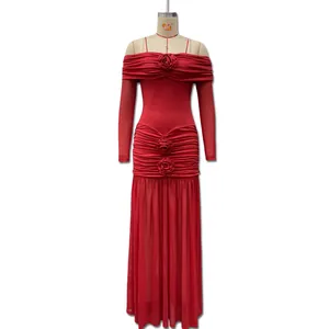 Detail view of red off-shoulder evening dress with 3D rose flowers and mesh sleeves