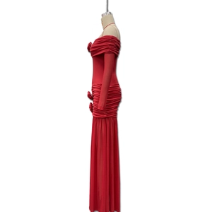 Detail view of red off-shoulder maxi dress with side floral appliqué and ruching fabric