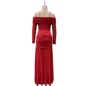 Detail of red off-shoulder ruched dress showing high-quality pleated fabric and texture