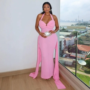 Pink halter dress detail featuring pleated V-neck with metal ring and elegant side drapes