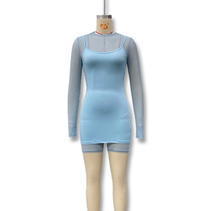 Detail of light blue sheer mesh long sleeve top and slim bodycon cami dress set