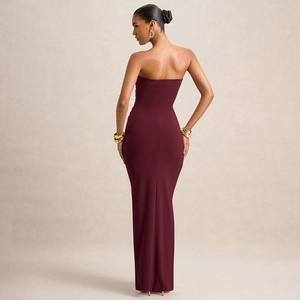 Elegant burgundy backless evening gown with a slim fit and floor-length silhouette