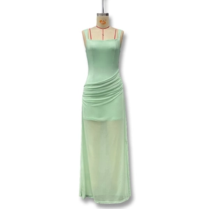 Detailed view of light green sleeveless maxi dress with pleated waist and sheer mesh overlay