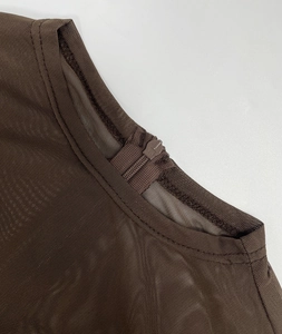 Detail view of coffee mesh top featuring high-quality back neckline zipper closure