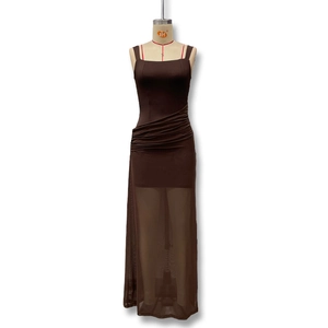 Detail of ruched dark brown sleeveless dress with sheer mesh paneling on the skirt
