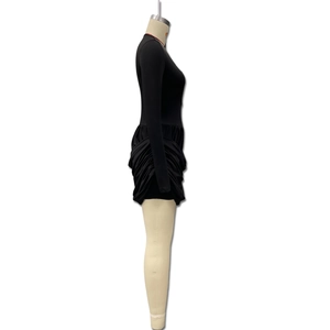Detailed side view of black long sleeve mini dress with ruching and layered skirt details