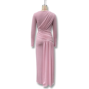 Detail view of the asymmetric ruched design and pleated back on this pink maxi dress