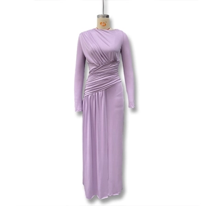Detail view of ruched lilac bodycon maxi dress with side folds and elastic fabric