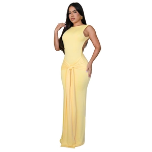 Elegant pale yellow backless maxi dress with side waist knot detail and slim fit design