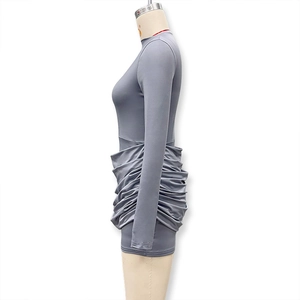 Detailed view of dark grey slim fit mini dress with ruched pleats and side draping texture