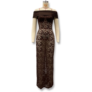 Detailed close-up of brown floral lace fabric and off-shoulder neckline on a dress