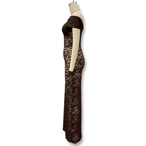 Macro detail of fine floral lace texture on a brown off-the-shoulder slim evening dress