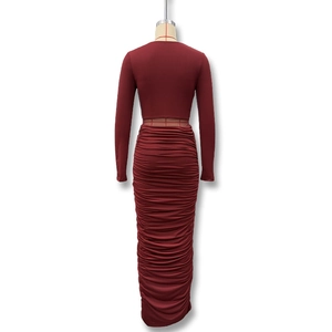 Detailed view of wine red ruched bodycon skirt fabric and horizontal texture