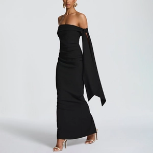 Elegant black off-shoulder maxi dress with a dramatic side-draping bow ribbon detail
