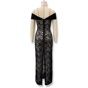 Macro detail of elegant black floral lace fabric on a form-fitting evening gown back