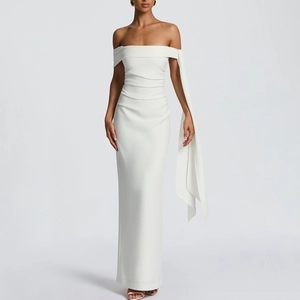 Detailed view of white off-shoulder evening dress with elegant waist pleats and side ribbon