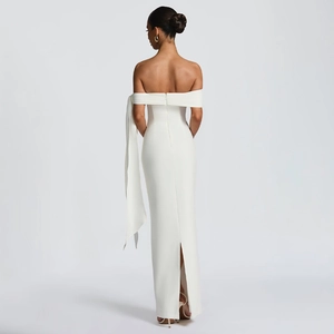Detailed back view of white off-shoulder maxi dress with zipper and side streamer
