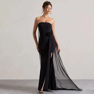 Elegant strapless black gown with 3D floral accent, high slit and sheer tulle cape