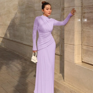 Detail showing elegant lavender ruched dress texture and slim fit design in outdoor light