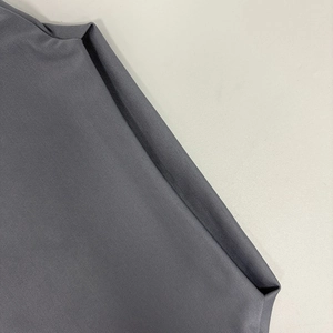 Detail shot of the dark grey ribbed fabric texture for this slim fit bodycon dress