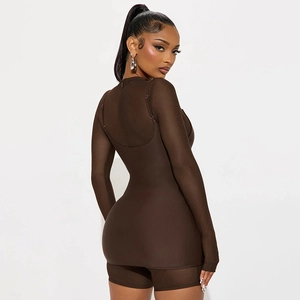 Detail of dark brown mesh long sleeve top and matching high waist slim shorts set