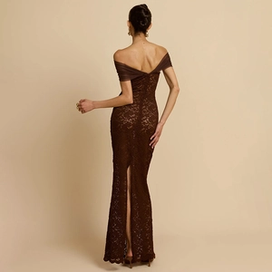 Detail of elegant off-shoulder brown lace dress featuring a back slit and sheer mesh accents
