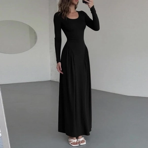 Elegant black long sleeve maxi dress with pleated waist and slim fit French style silhouette