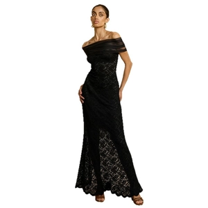 Elegant black off-the-shoulder lace dress with floral patterns and a side slit