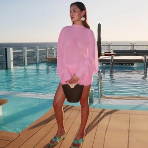 Elegant pink long sleeve chiffon dress with pleated details for women in resort style