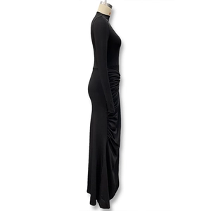 Detail of ruched side design and premium knit fabric on women's long sleeve maxi dress