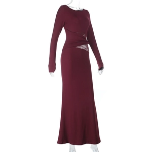 Detail of cross-wrap waist with lace patchwork on a slim fit wine red long dress