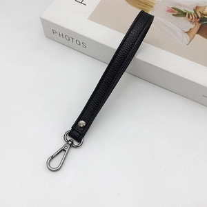 Black litchi grain leather wristlet strap with a durable gunmetal swivel lobster clasp