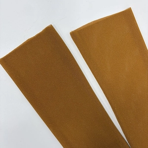 Close-up of caramel rib-knit sleeves featuring high elasticity and fine texture detail