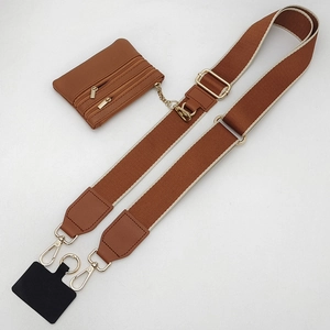 Brown adjustable crossbody phone strap set with mini zippered pouch and gold hardware