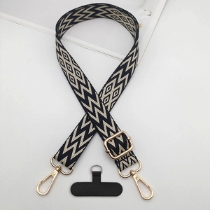 Adjustable wide woven phone lanyard with black and white patterns and golden metal hardware