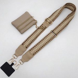Detail of adjustable woven shoulder strap with gold hooks and mini triple-zipper leather pouch